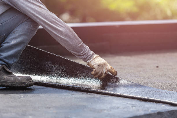 Professional Basement Waterproofing technician working in Jefferson, OR